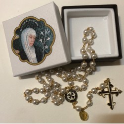 Rosary in glass with...